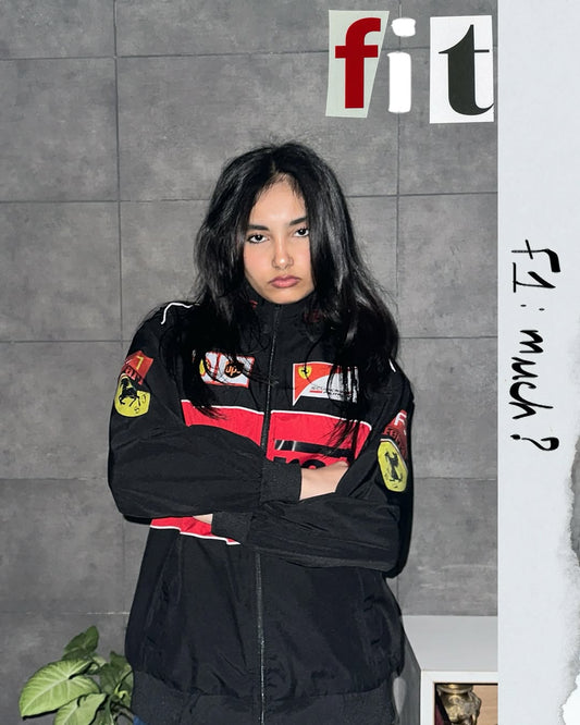 Direct front view of the premium premium printed Ferrari racing streetwear jacket fully zipped. Displays the iconic Ferrari horse logo graphic, chest sponsors, and the boxy aerodynamic silhouette of standard Bikercore aesthetics.