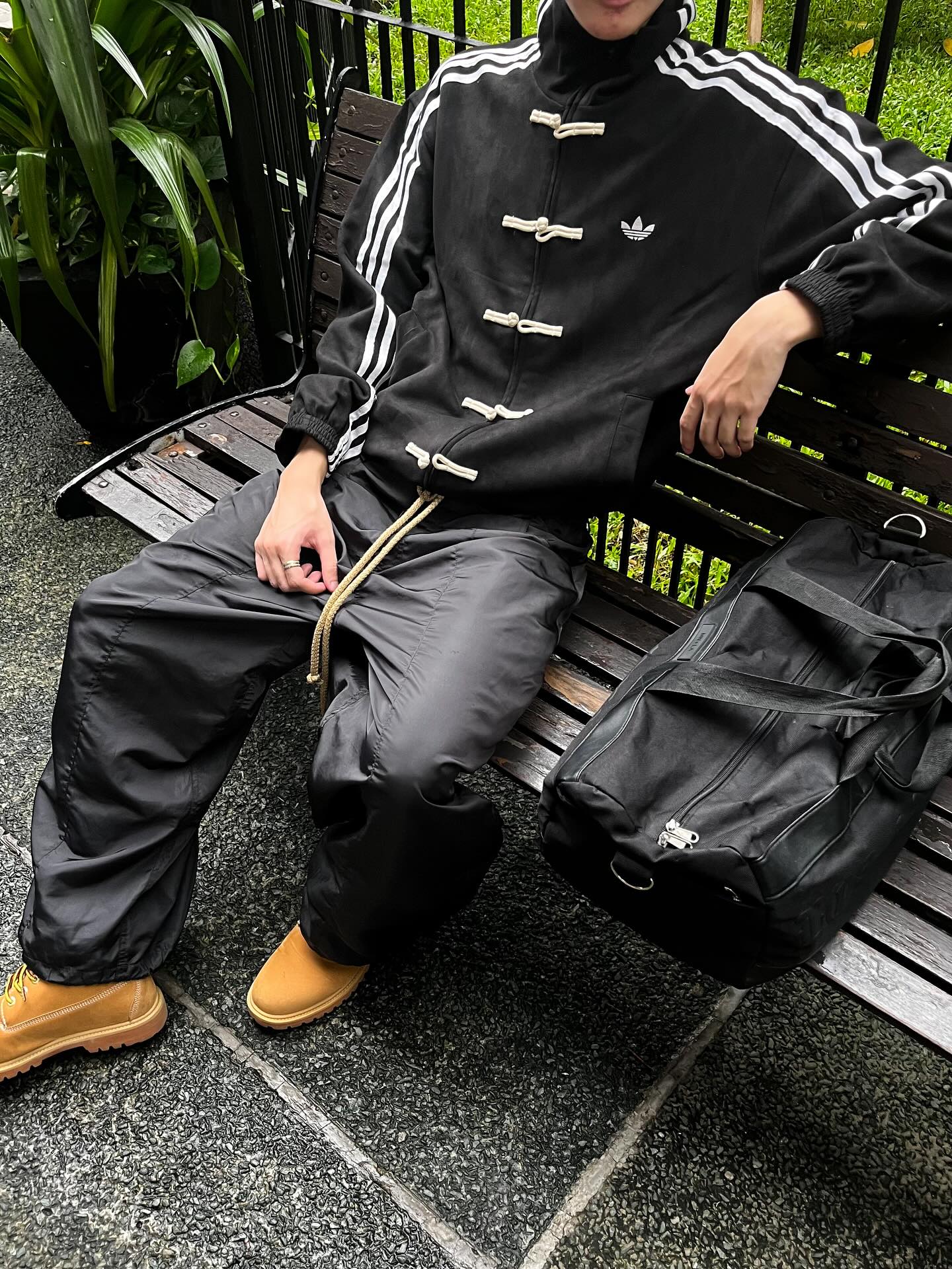 Streetwear fashion look for men featuring the Gigavibe Black CNY Jacket