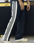 Front view of black snap pants for casual street style