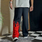 Bold flame printed baggy trousers in cotton fabric