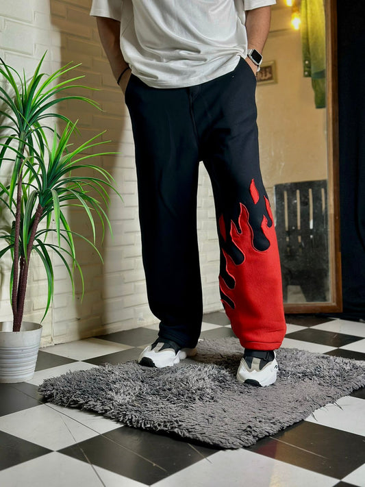 Unisex flame baggy pants with fire design – front view
