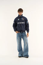 BMW Petronas jacket zipper close-up showing sturdy stitching and print detailing