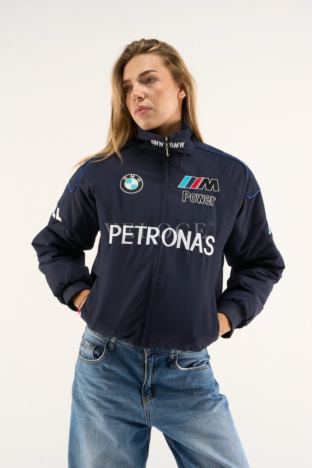 BMW M Power logo close-up on Petronas racing jacket sleeve – navy printed design