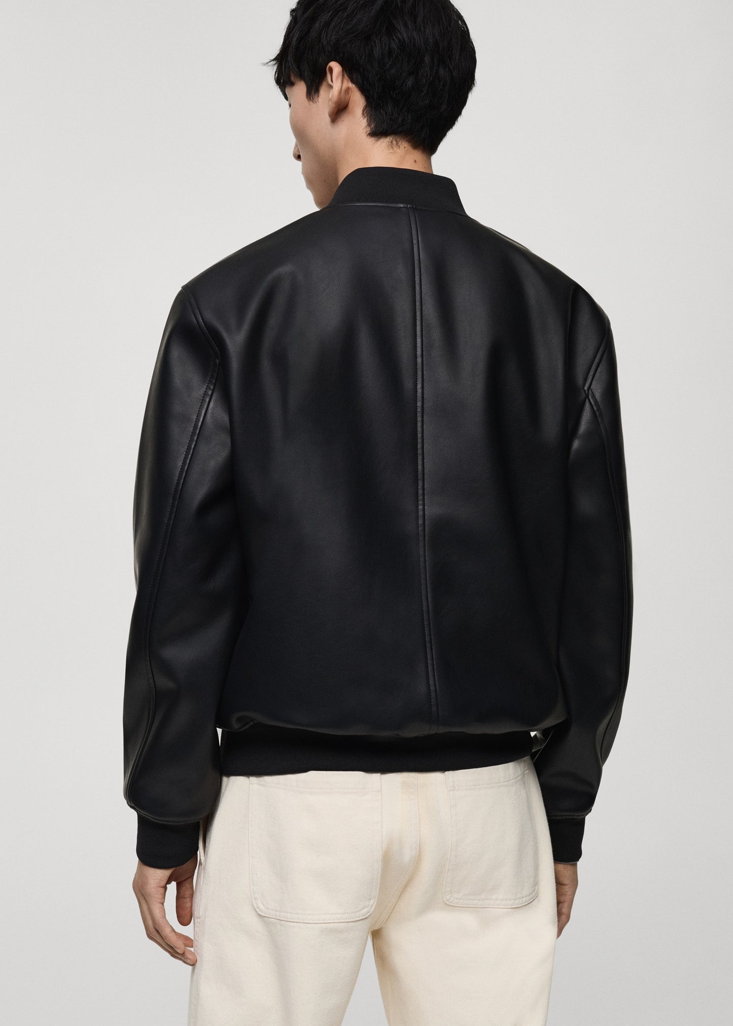 Back view of Gigavibe Black Leather Bomber Jacket with ribbed hem and cuffs