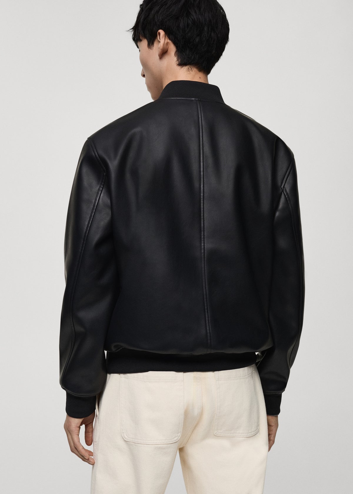 Back view of Gigavibe Black Leather Bomber Jacket with ribbed hem and cuffs