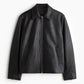 Man wearing a Gigavibe Black Boxy Leather Jacket front view – premium streetwear leather outerwear