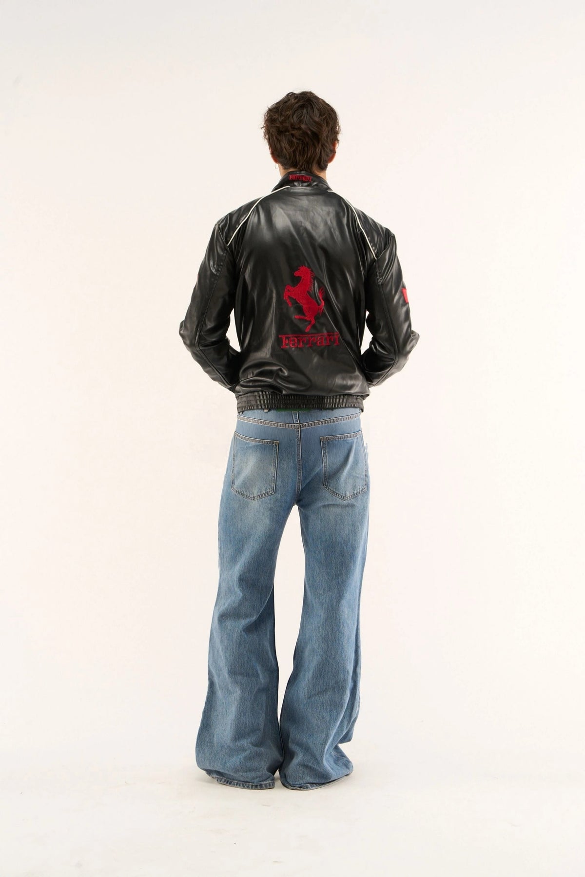 Ferrari racing jacket leather back embroidery with bold red logo on premium black leather finish