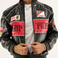 Close-up of ferrari motorsport jacket chest detailing with racing badges and premium leather craftsmanship