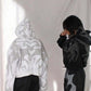 Model wearing oversized Gigavibe Depth Hoodie black & white for casual streetwear look