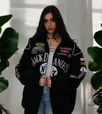 Women wearing a Premium Jack Daniels jacket modern look multiple brand logos.