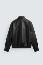 Black leather jacket on a light gray background