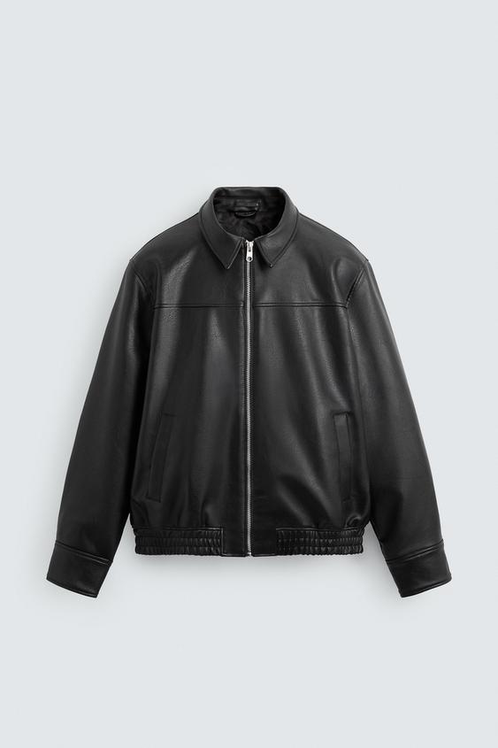Black faux leather bomber jacket zipper and pocket detail