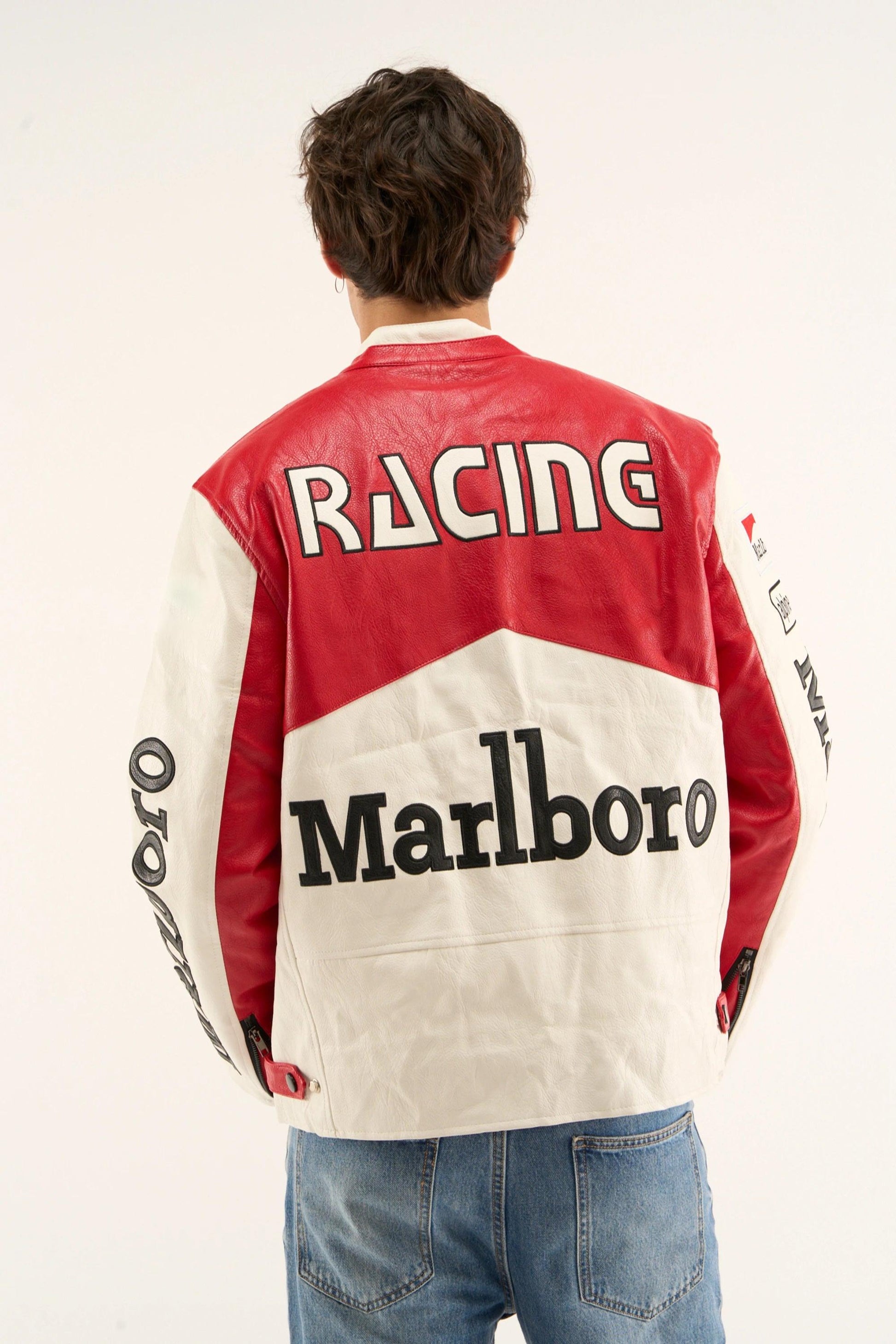 Back view of a red and white Marlboro racing jacket with bold “Racing” and “Marlboro” text.