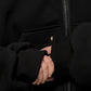 Close-up of soft fleece fabric and zipper on balaclava hoodie