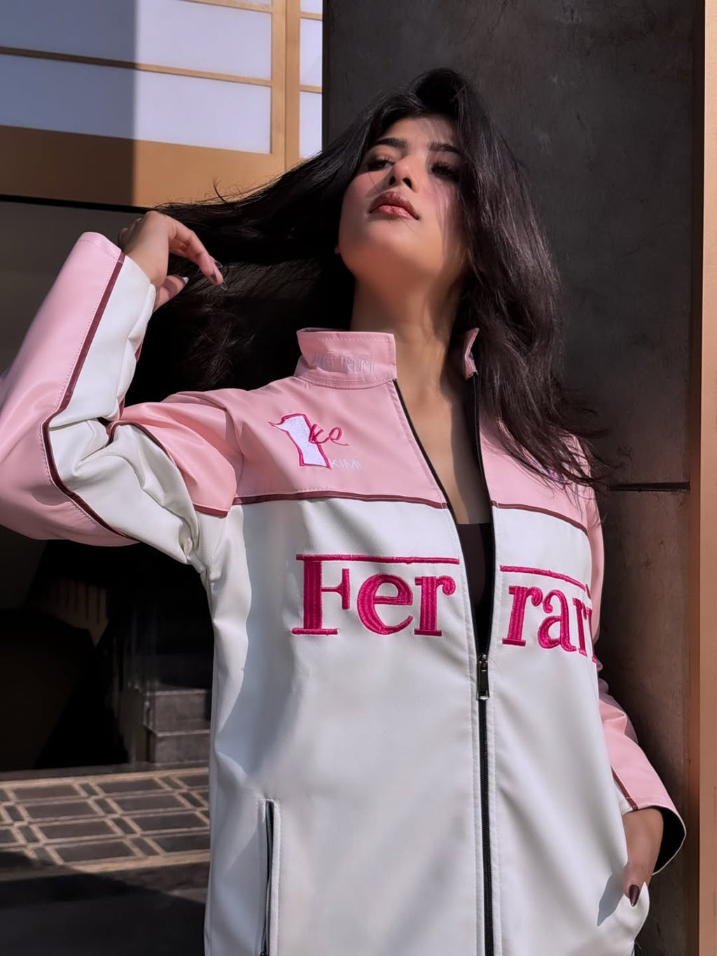 Front zipper design of pink Ferrari streetwear jacket