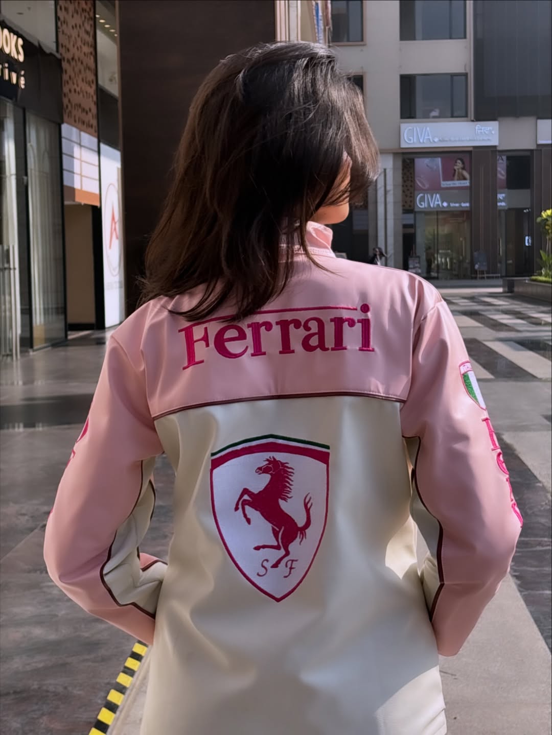 Back logo detailing on pink Ferrari racing jacket by Gigavibe