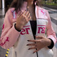 Close-up of pink Ferrari leather jacket premium stitching