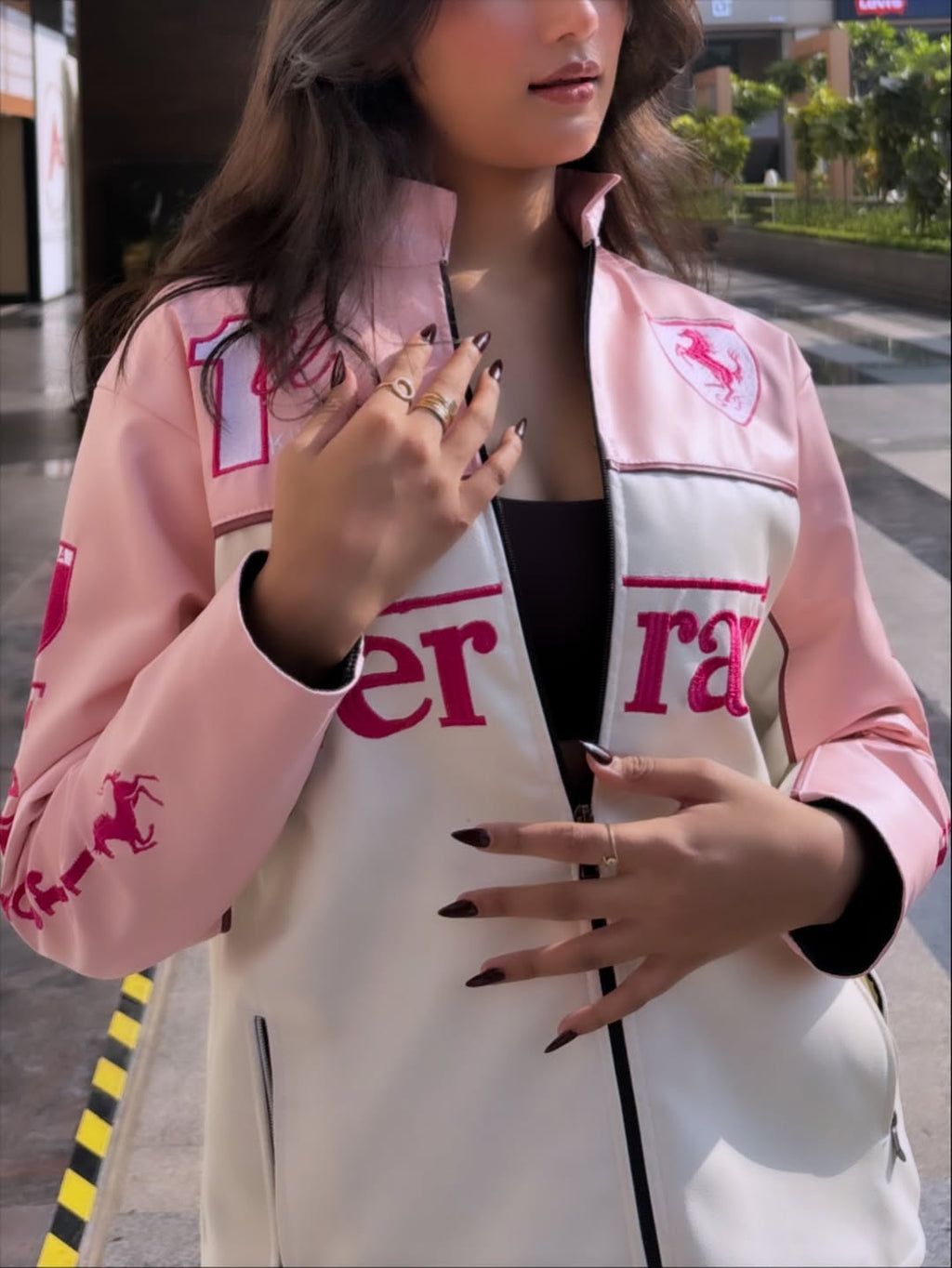Close-up of pink Ferrari leather jacket premium stitching