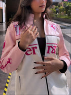 Close-up of pink Ferrari leather jacket premium stitching