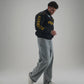Model styling Gigavibe Porsche Jacket Embroidered black Porsche bomber jacket with motorsport detailing