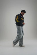 Model styling Gigavibe Porsche Jacket Embroidered black Porsche bomber jacket with motorsport detailing