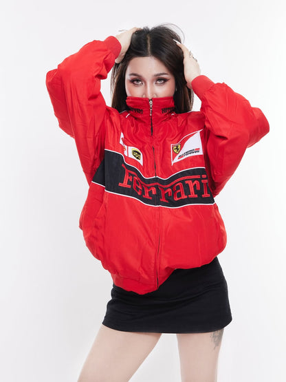 Detailed embroidery on Gigavibe red Ferrari jacket featuring Ferrari racing logo.
