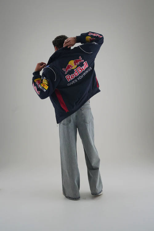 Model showcasing Red Bull Racing Jacket embroidered back design – Gigavibe Formula 1 merchandise