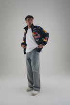 Red Bull Bomber Jacket styled with jeans and white t-shirt – Gigavibe streetwear racing jacket style