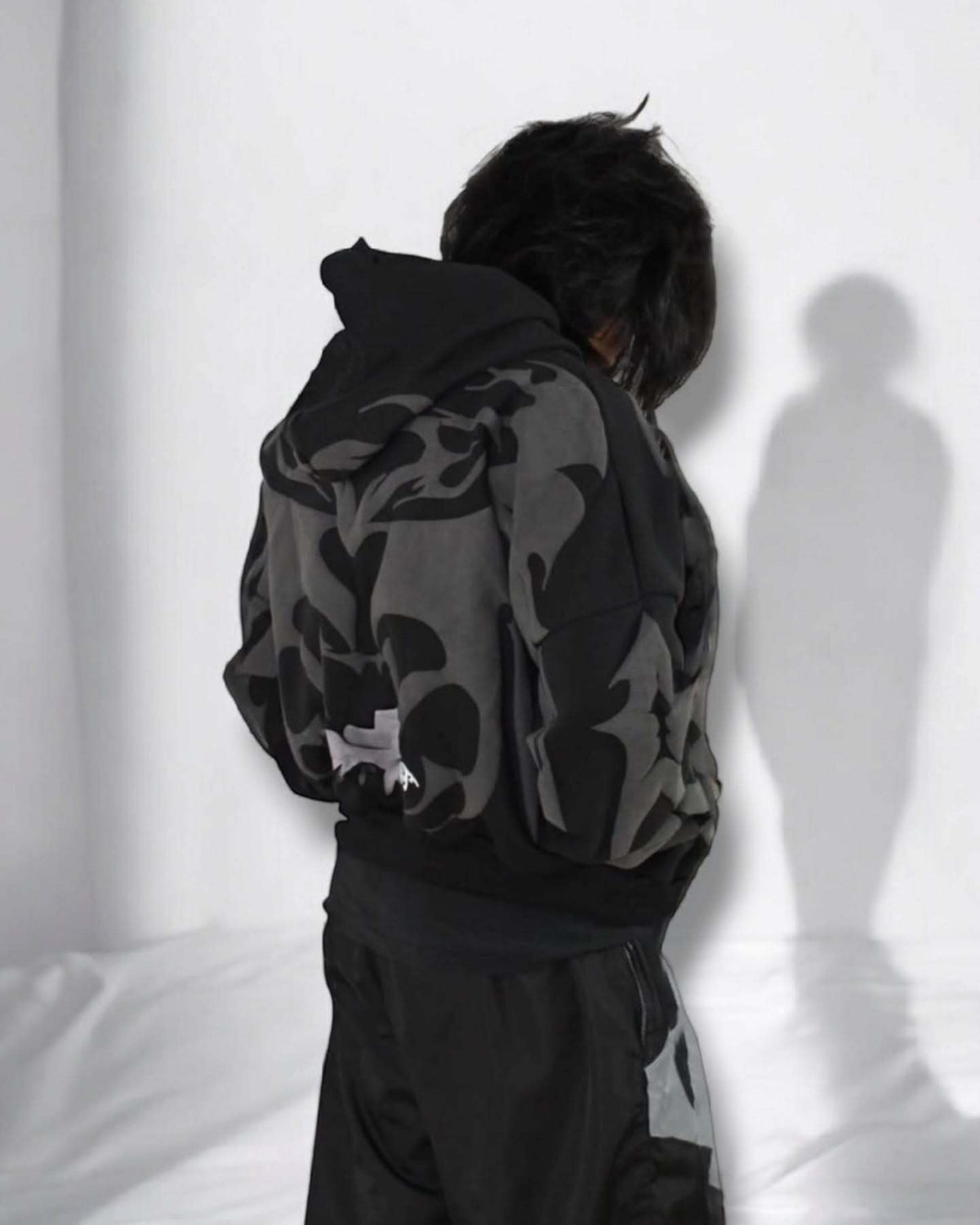 Gigavibe Shadow Depth Hoodie laid flat showing fabric texture and quality