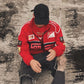 Red Ferrari F1 Jacket with sleek design, durable fabric, and iconic branding