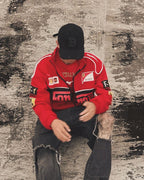 Red Ferrari F1 Jacket with sleek design, durable fabric, and iconic branding