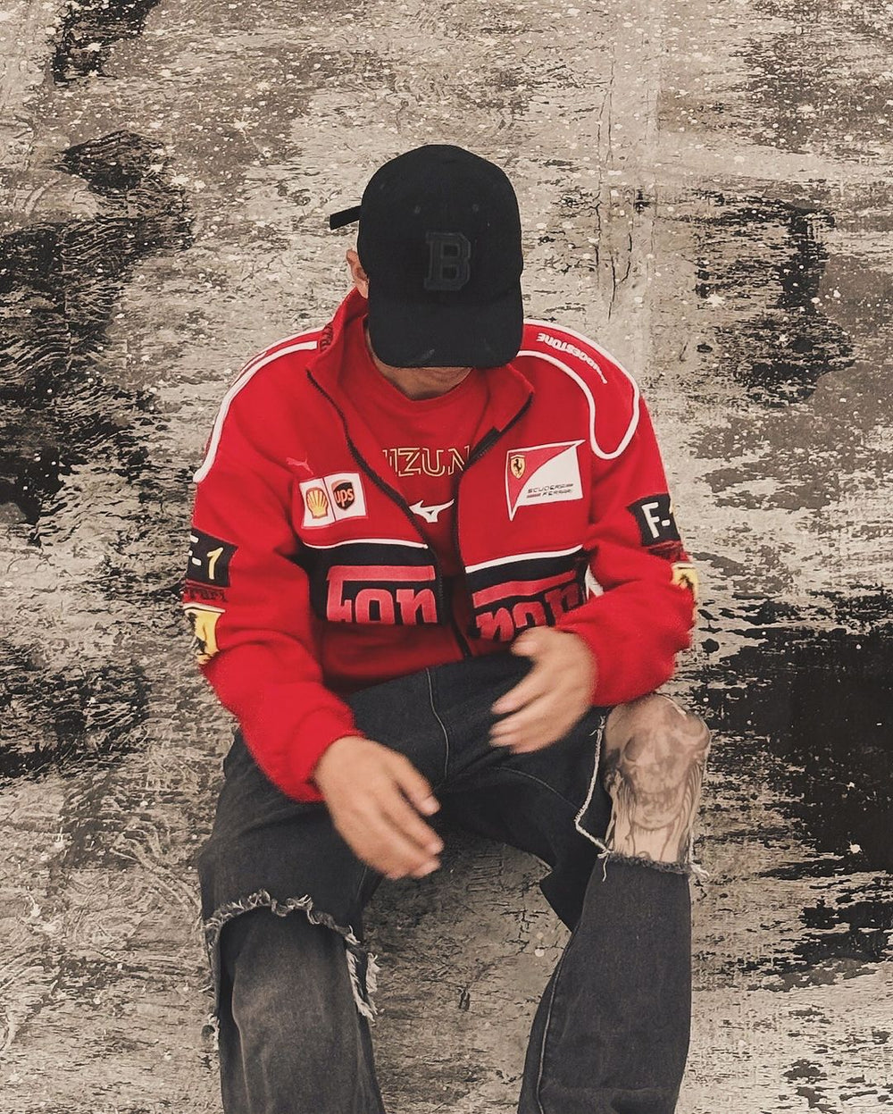 Red Ferrari F1 Jacket with sleek design, durable fabric, and iconic branding