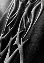 Solo Leveling Jin Woo hoodie puff print detail close-up