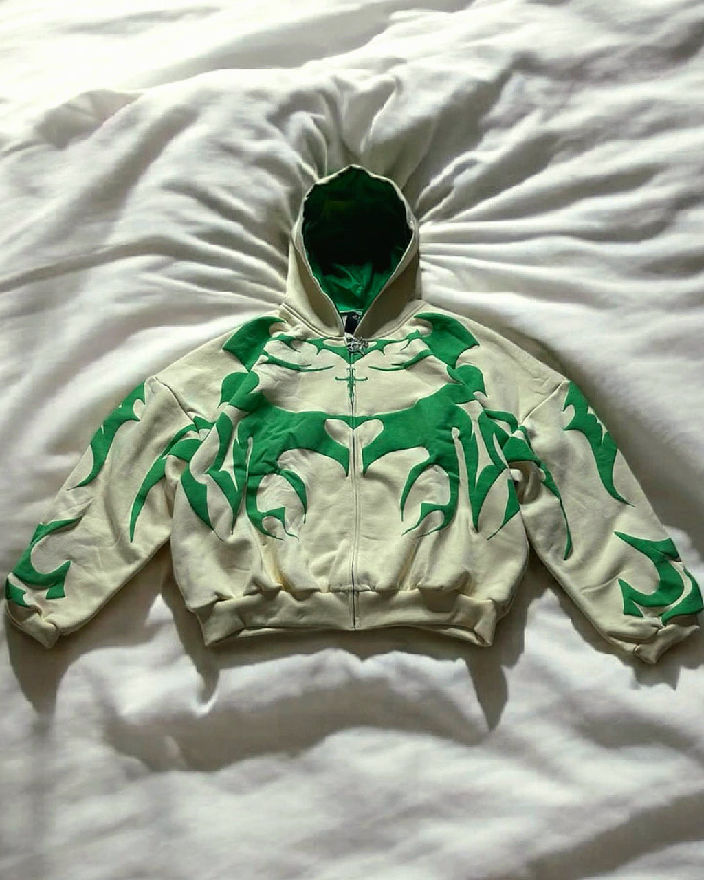 Tribal Depth Hoodie beige variant styled with sneakers and denim