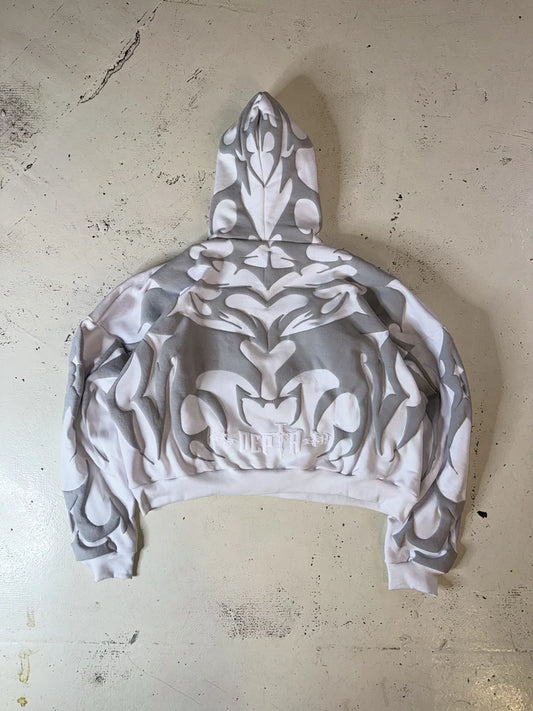 Close-up of oversized puff printed depth on white hoodie