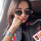 Anushka Sen wearing a Black Ferrari Jacket, embracing the iconic racer look with a trendy edge