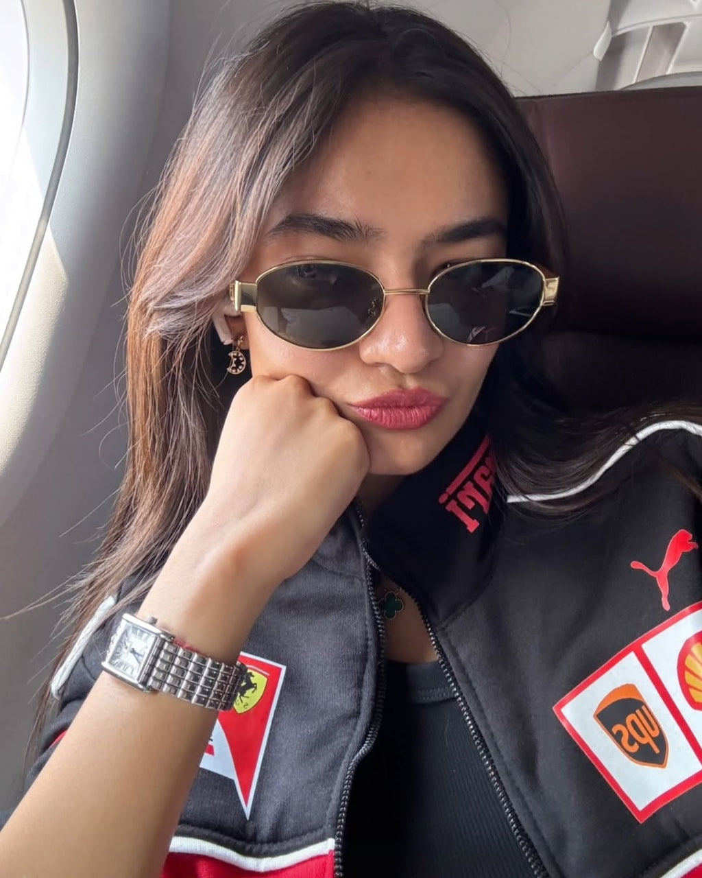Anushka Sen wearing a Black Ferrari Jacket, embracing the iconic racer look with a trendy edge