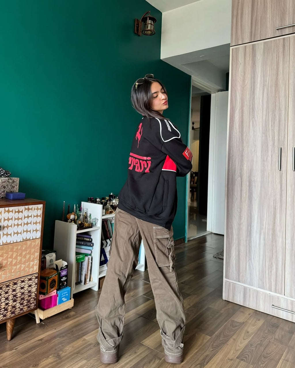 Anushka Sen styling a Black Ferrari Jacket with effortless elegance and streetwear vibes