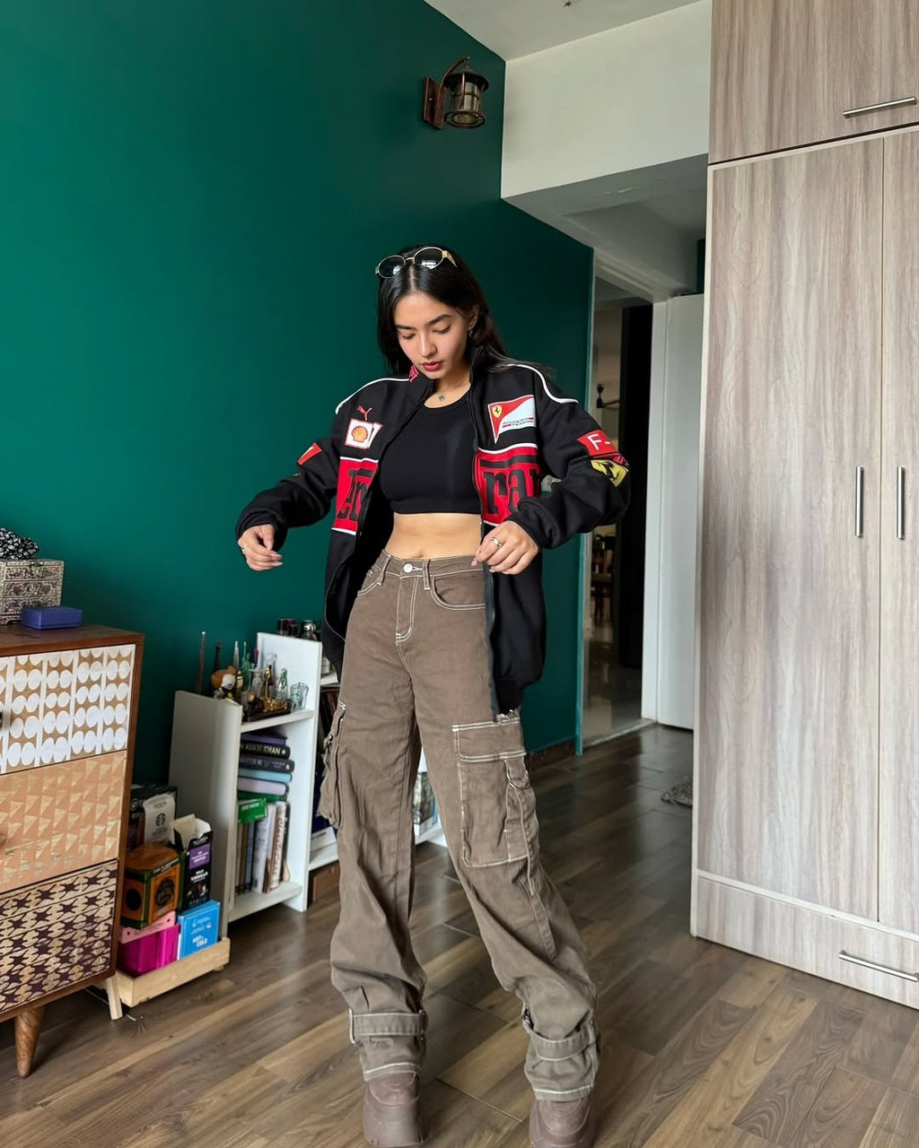 Anushka Sen sporting a Black Ferrari Jacket, blending vintage racing fashion with modern style