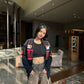 Anushka Sen flaunting a stylish Black Ferrari Jacket, making a statement in high-end motorsport fashion