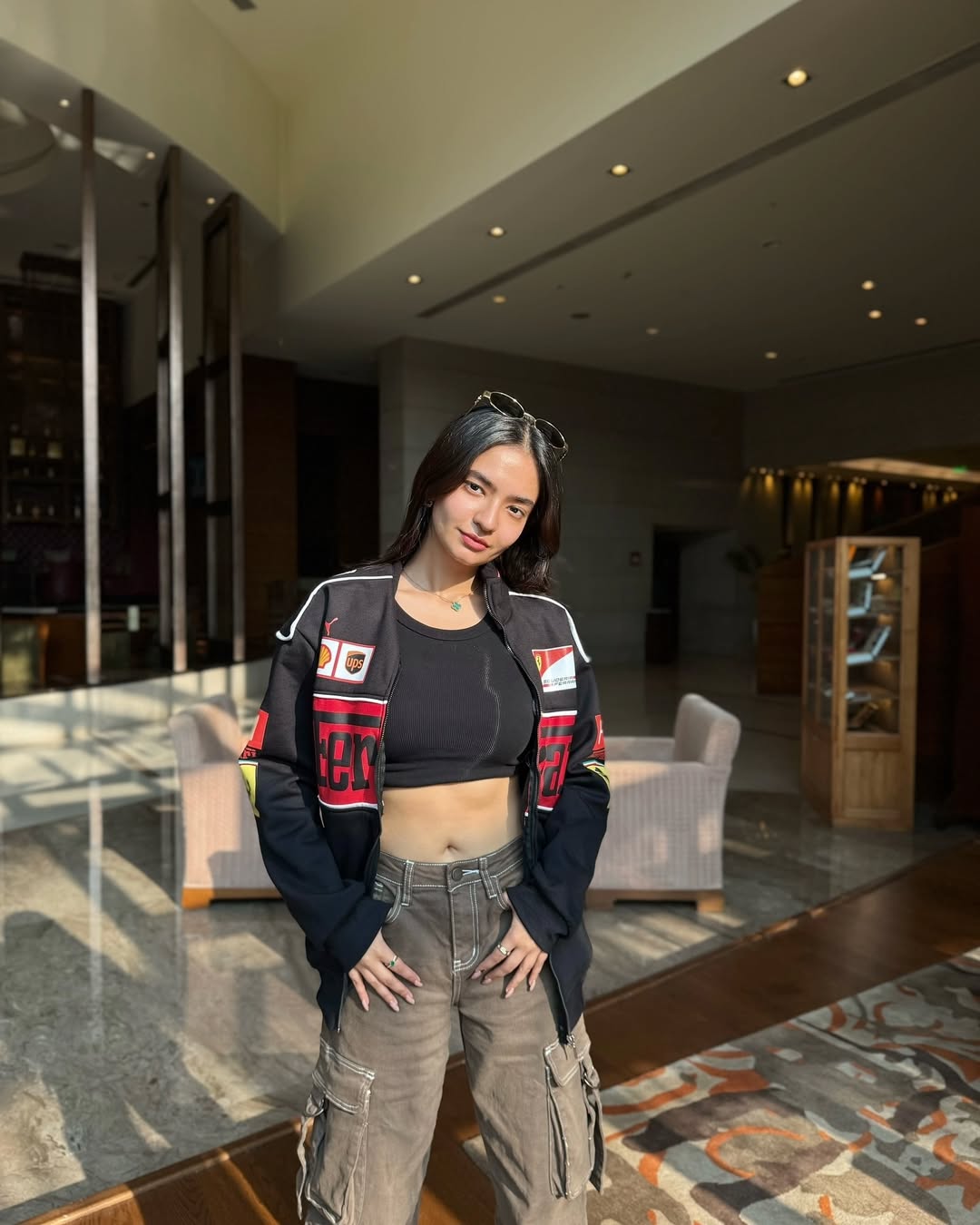 Anushka Sen flaunting a stylish Black Ferrari Jacket, making a statement in high-end motorsport fashion