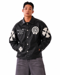 Male model wearing the Midnight Black Gothic cross patch faux leather jacket by Gigavibe, highlighting the monochrome dark luxury aesthetic