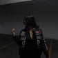 Model styling Jack Daniels embroidered racing jacket unisex by Gigavibe, inspired by NASCAR embroidered jackets.