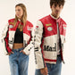Two people wearing matching red, white Marlboro racing jacket showing detailed motorsport logos