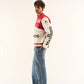 Side angle view of retro Marlboro F1 jacket highlighting contrast red and white panels.