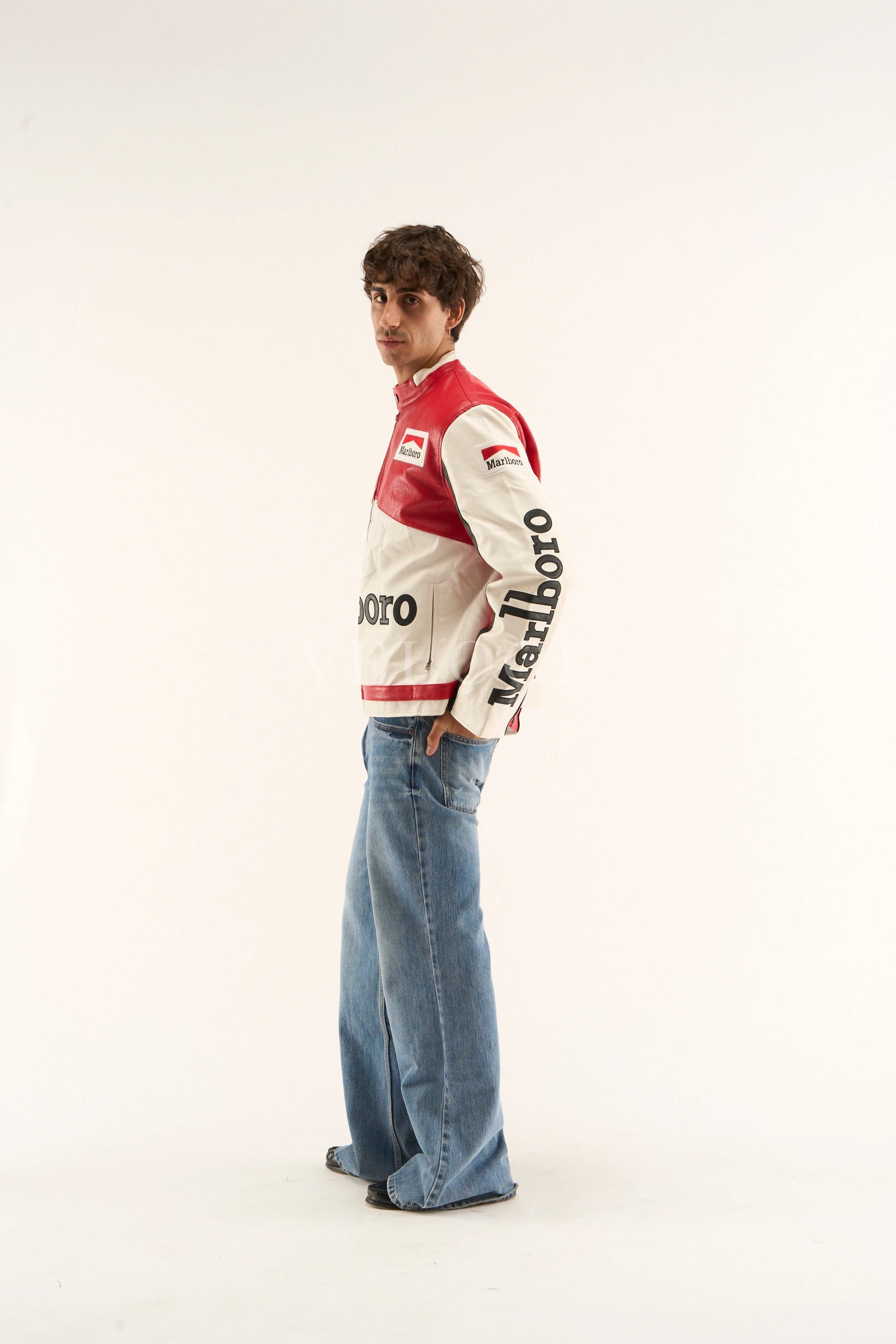 Side angle view of retro Marlboro F1 jacket highlighting contrast red and white panels.