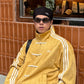Mustard Yellow CNY jacket model wearing streetwear style premium vegan suede Adidas alternative men women Gigavibe