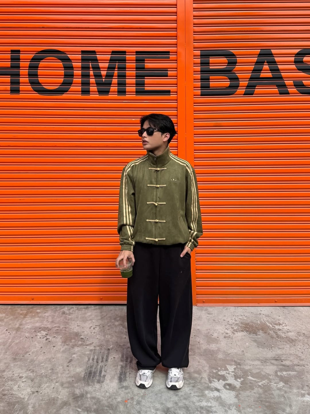 Olive Green CNY jacket model wearing premium vegan suede Adidas style alternative men women Gigavibe streetwear