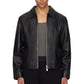 Direct front view of the Unisex Cropped Leather Jacket in matte black at Gigavibe. The model demonstrates the premium vegan leather drape, showing the exposed silver front zipper and the classic boxy proportions essential for modern darkwear fashion in India.
