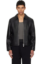 Direct front view of the Unisex Cropped Leather Jacket in matte black at Gigavibe. The model demonstrates the premium vegan leather drape, showing the exposed silver front zipper and the classic boxy proportions essential for modern darkwear fashion in India.